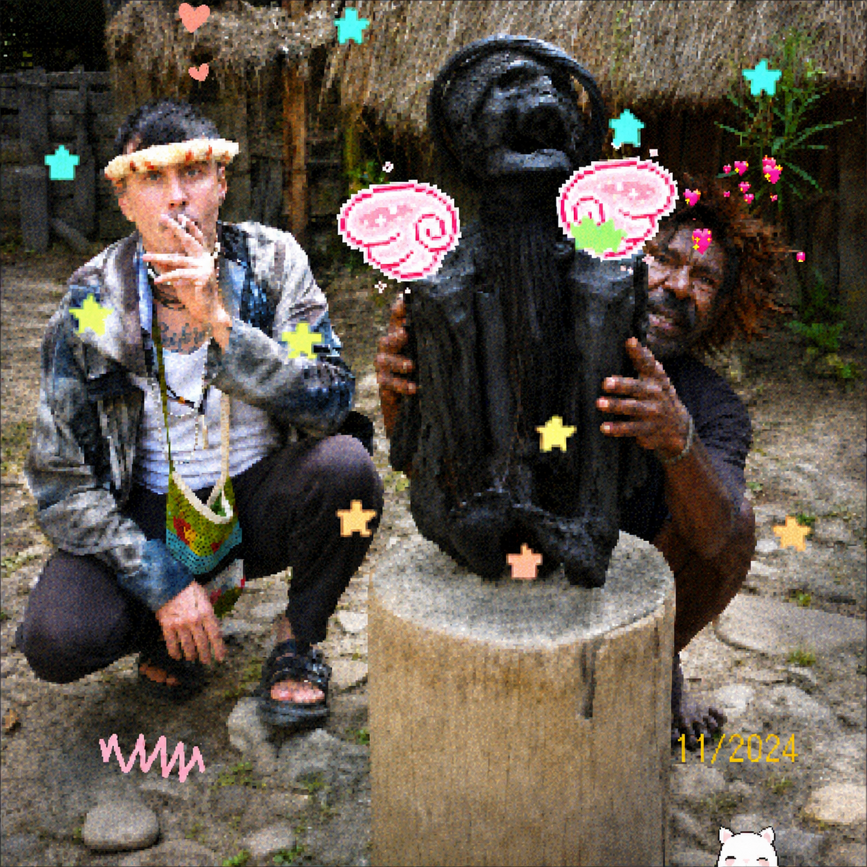 Dakota and Didimus with a Dani mummy in Papua