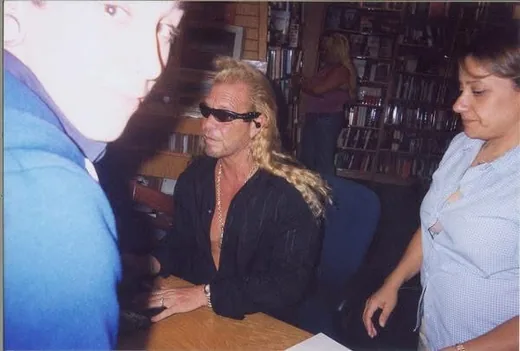 Dakota meeting Dog the Bounty Hunter in Detroit around 2009